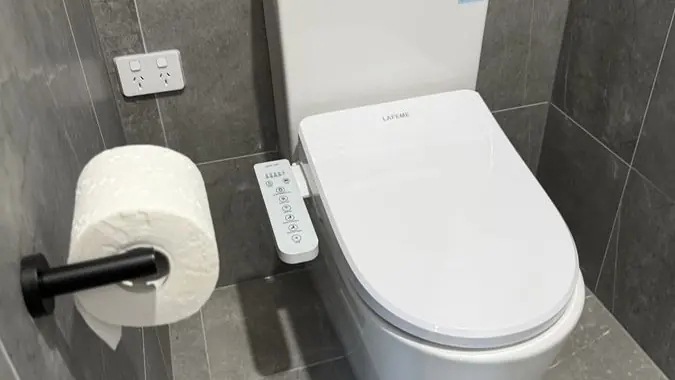 Toilet and connected bathroom plumbing, Mentone